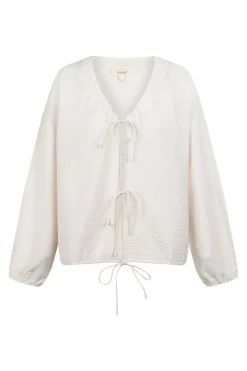 Blusa com laçadas