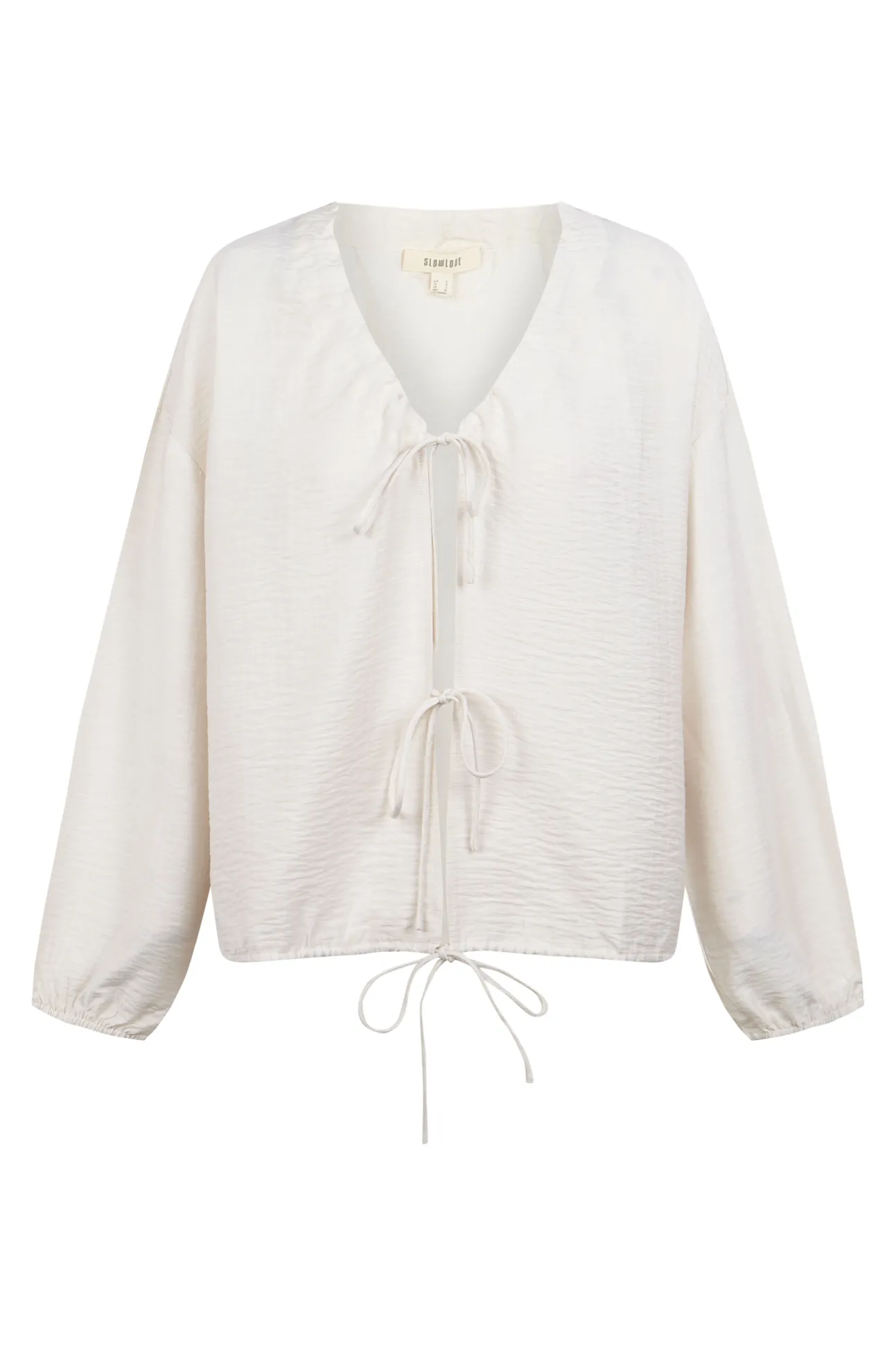 Blusa com laçadas