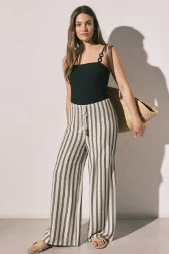 Calça comprida com estrutura de riscas