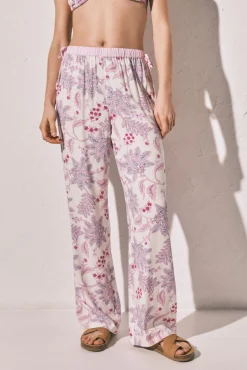 Calça comprida estampada de flores rosa