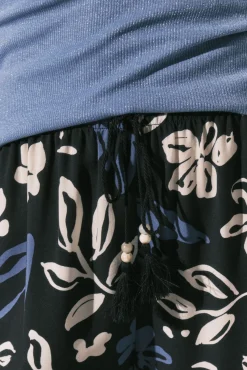 Calça comprida estampada de flores azul