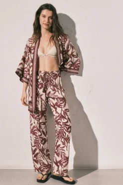 Calça comprida estampada grená