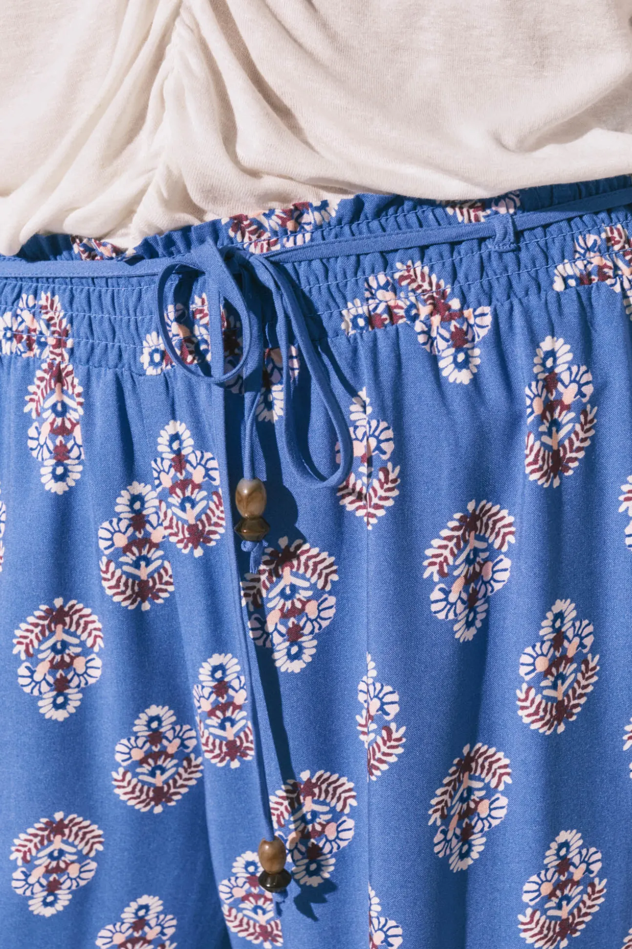 Calça comprida estampada selo azul