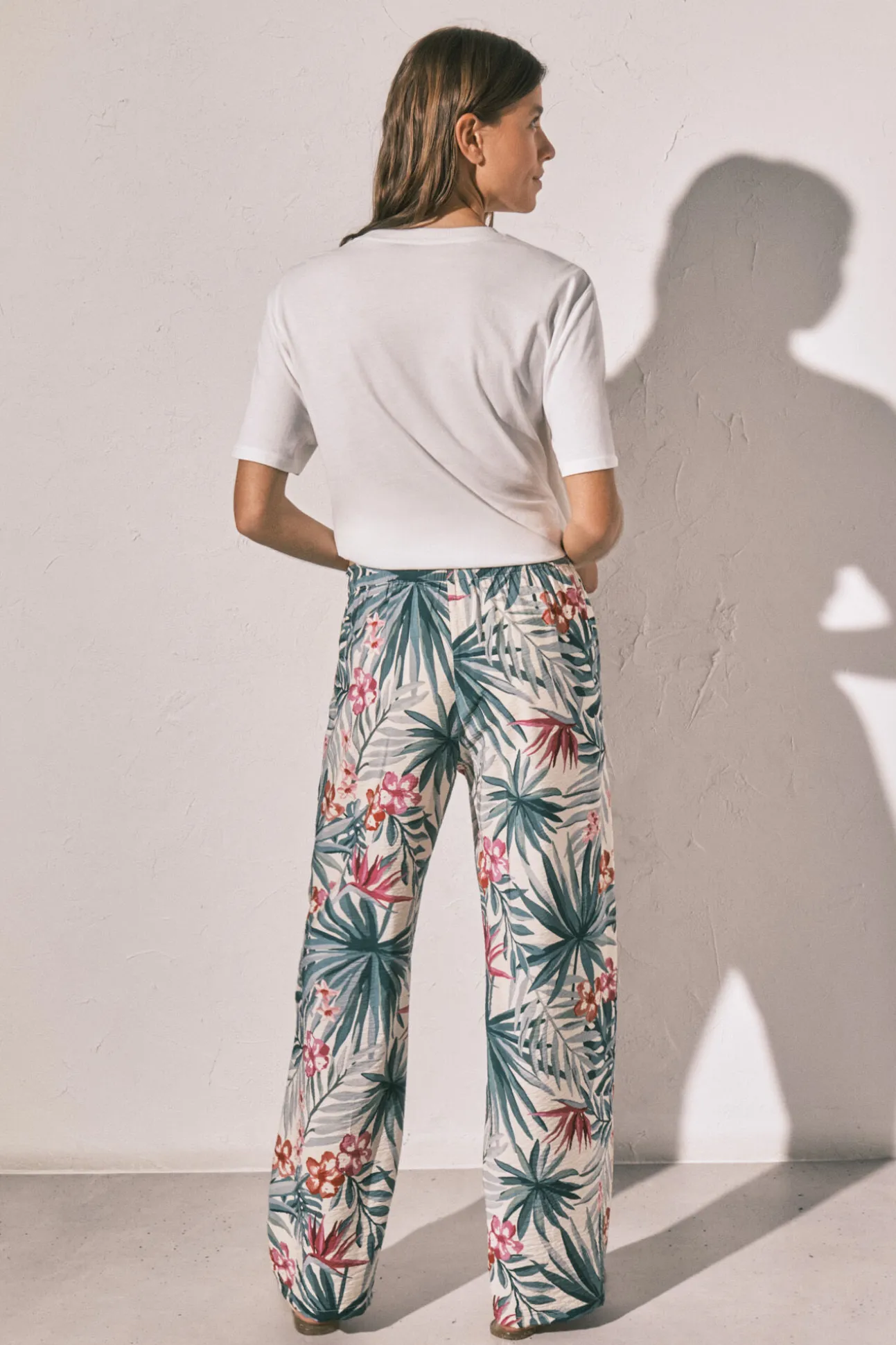 Calça comprida estampada verde
