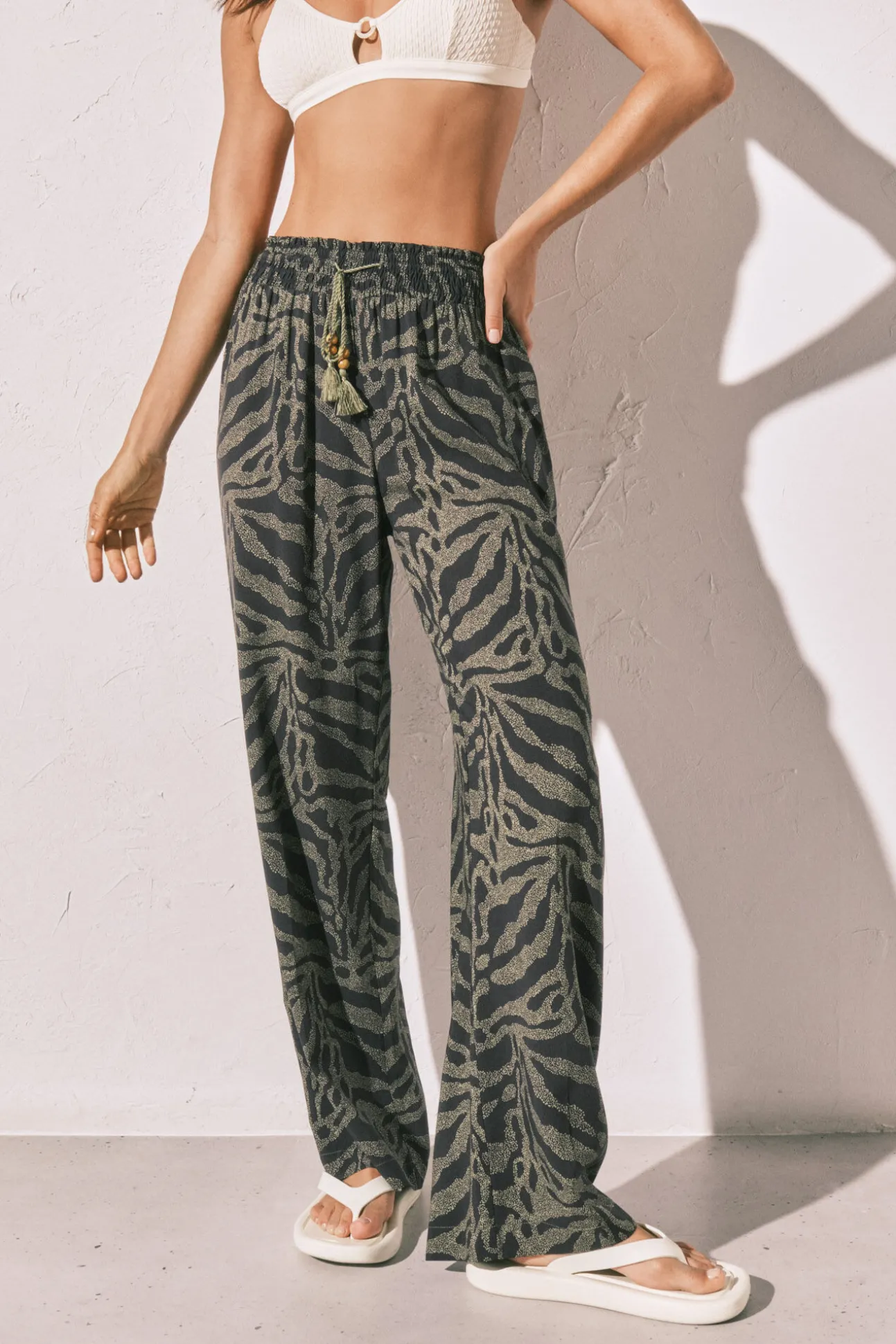 Calça comprida estampado animal