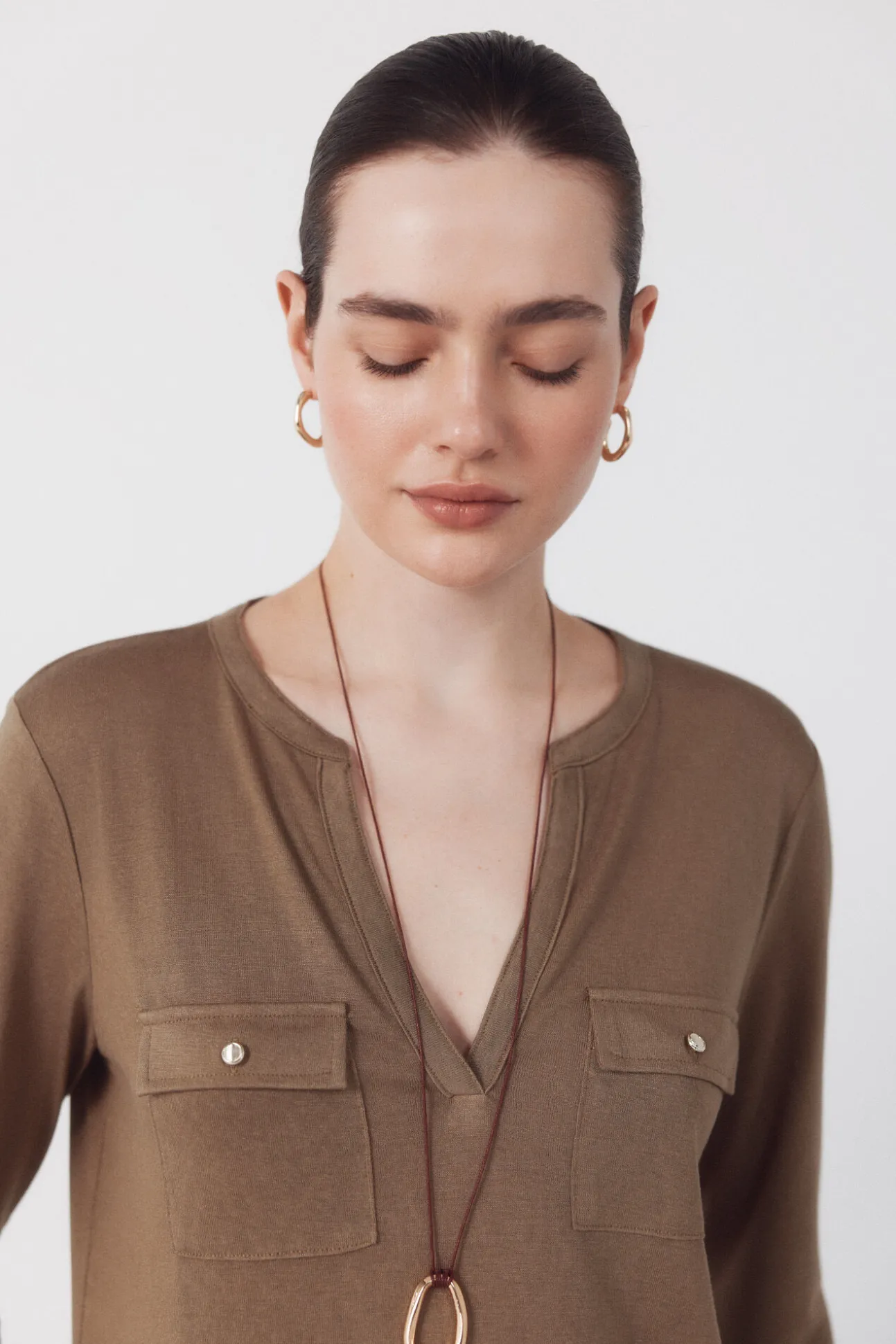 Camiseta com bolsos