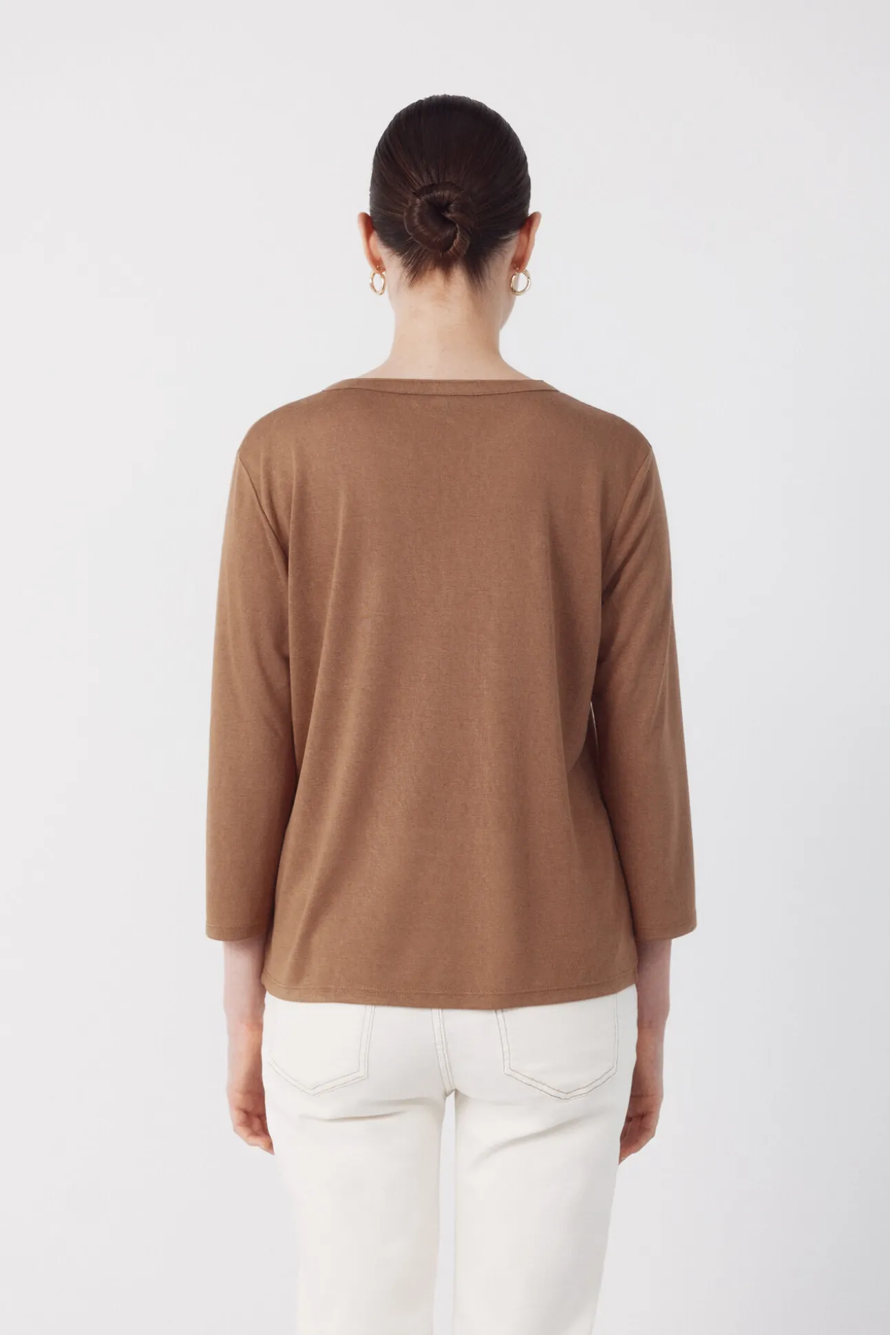 Camiseta com bolsos