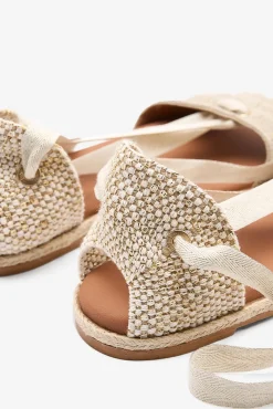 Sandália rasa de senhora Poipu com franjas