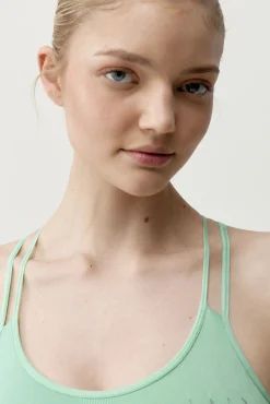 Top desportivo vermelho e verde menta