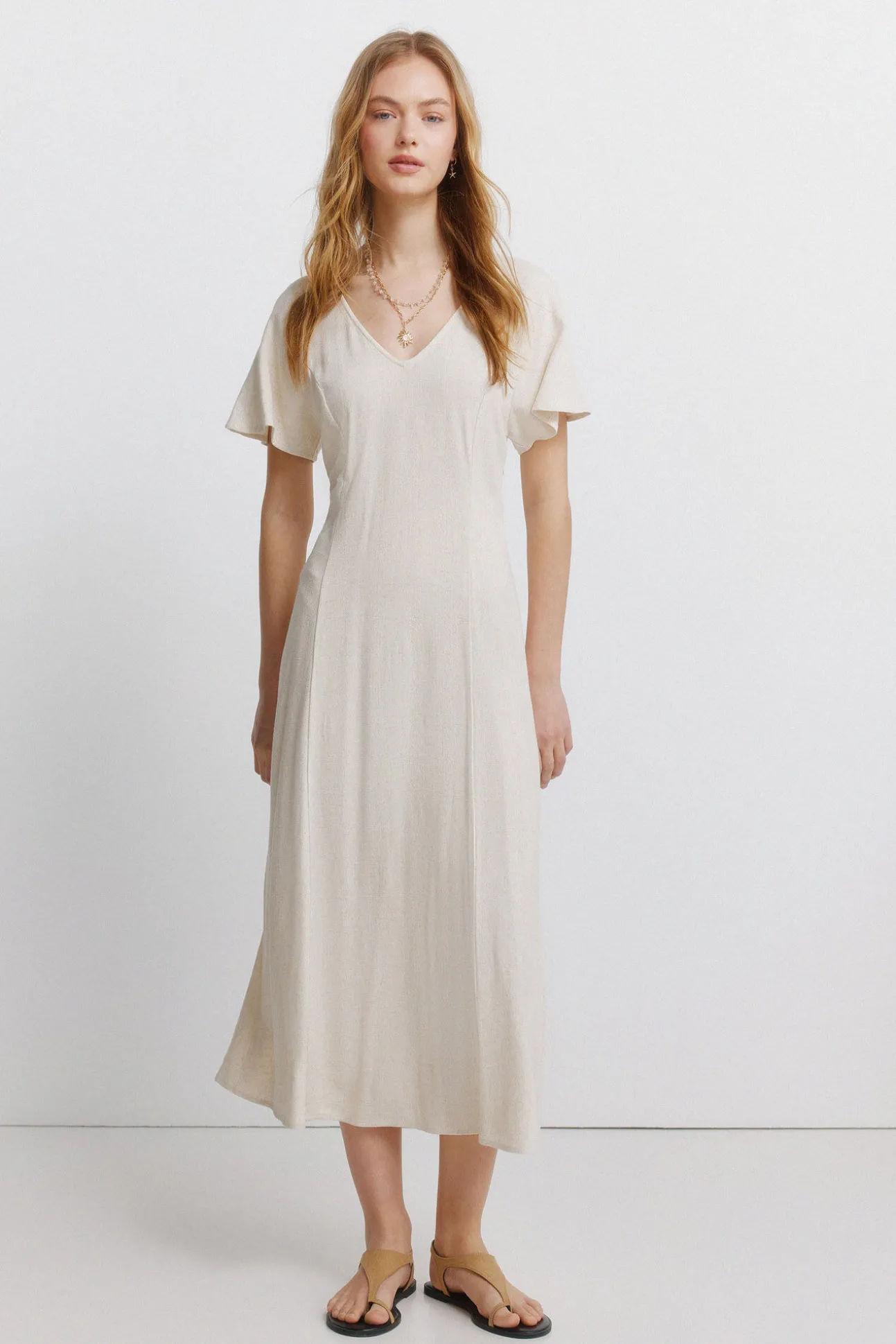Vestido midi em linho cruzado nas costas
